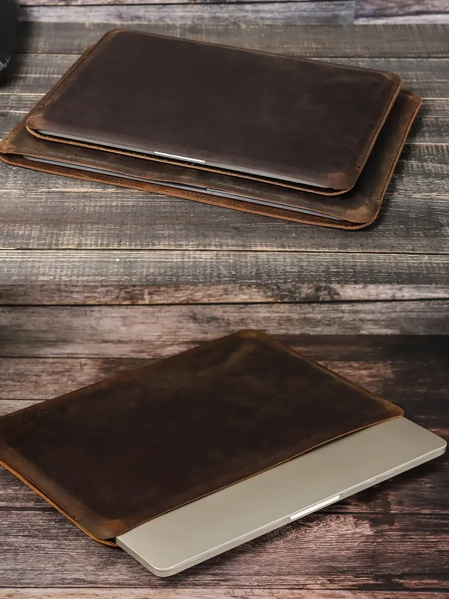 Genuine dark brown crazy horse leather laptop sleeve with a slim, minimalist design, an affordable luxury professional accessory for a sophisticated personal brand.