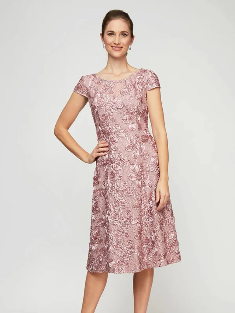 A high-end Alex Evenings short cocktail lace tea-length sequin dress showcasing elegant cap sleeves and a layered hemline.