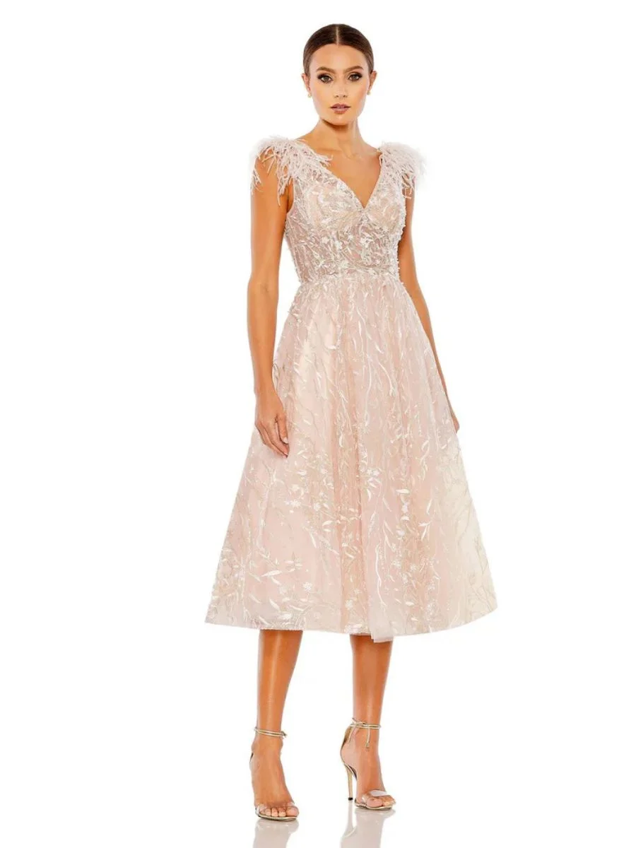 An exquisite Mac Duggal sequin feather detail midi cocktail dress featuring intricate embellishments and a structured pencil cut.

