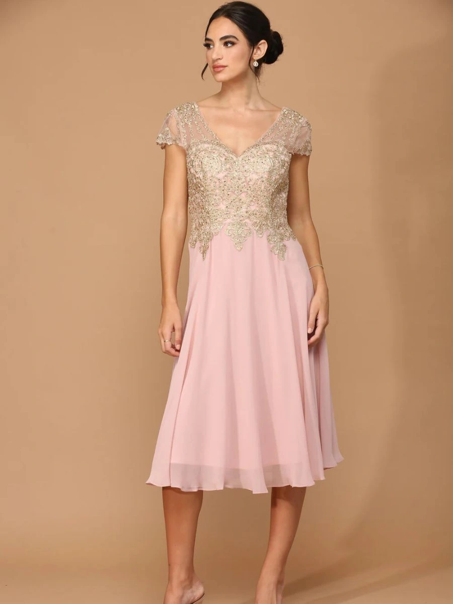 A classic Eva Fashion short cap sleeve formal chiffon dress in dusty rose featuring a light knee-length cut.
