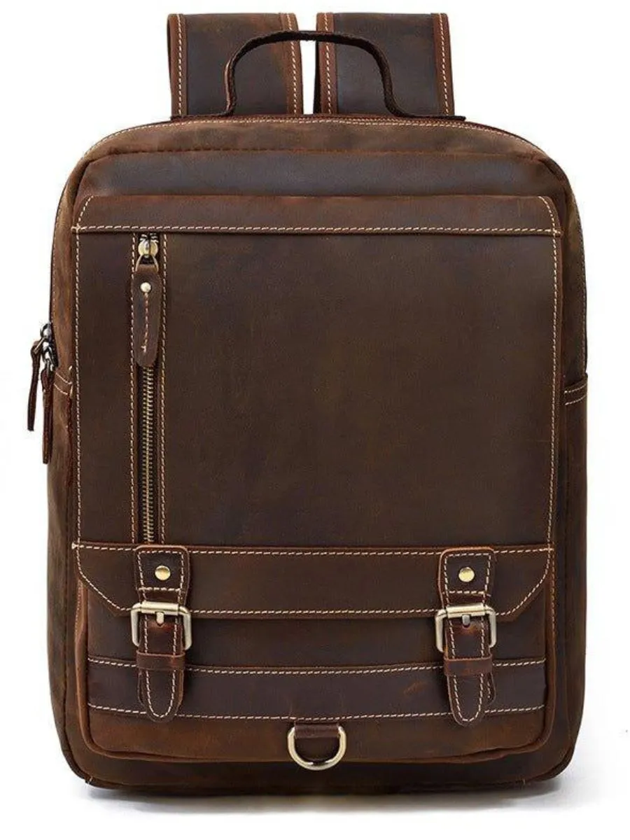 A minimalist square cut vintage leather laptop backpack with clean geometric stitching and secure top closures.
