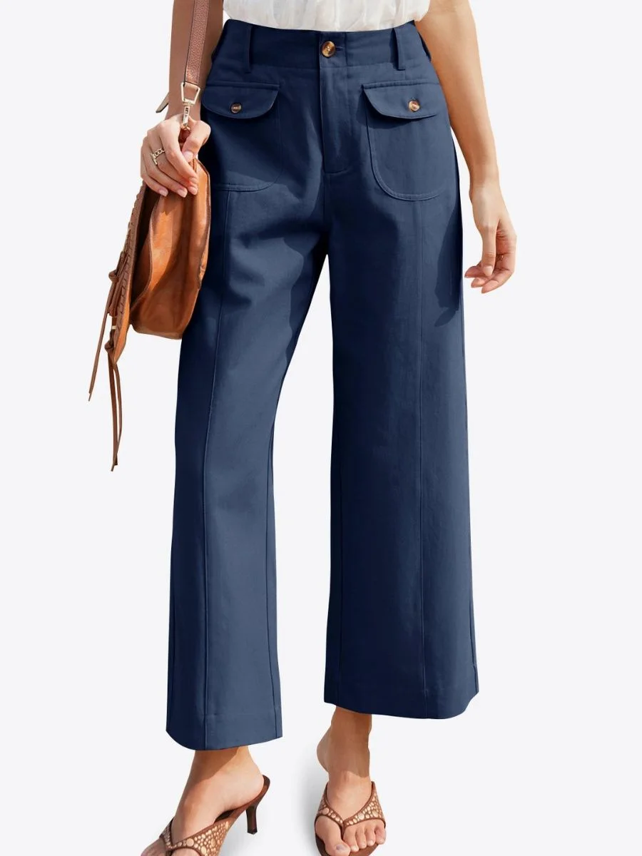 Cicy Bell navy high waisted cropped wide leg pants with central seam on a model.