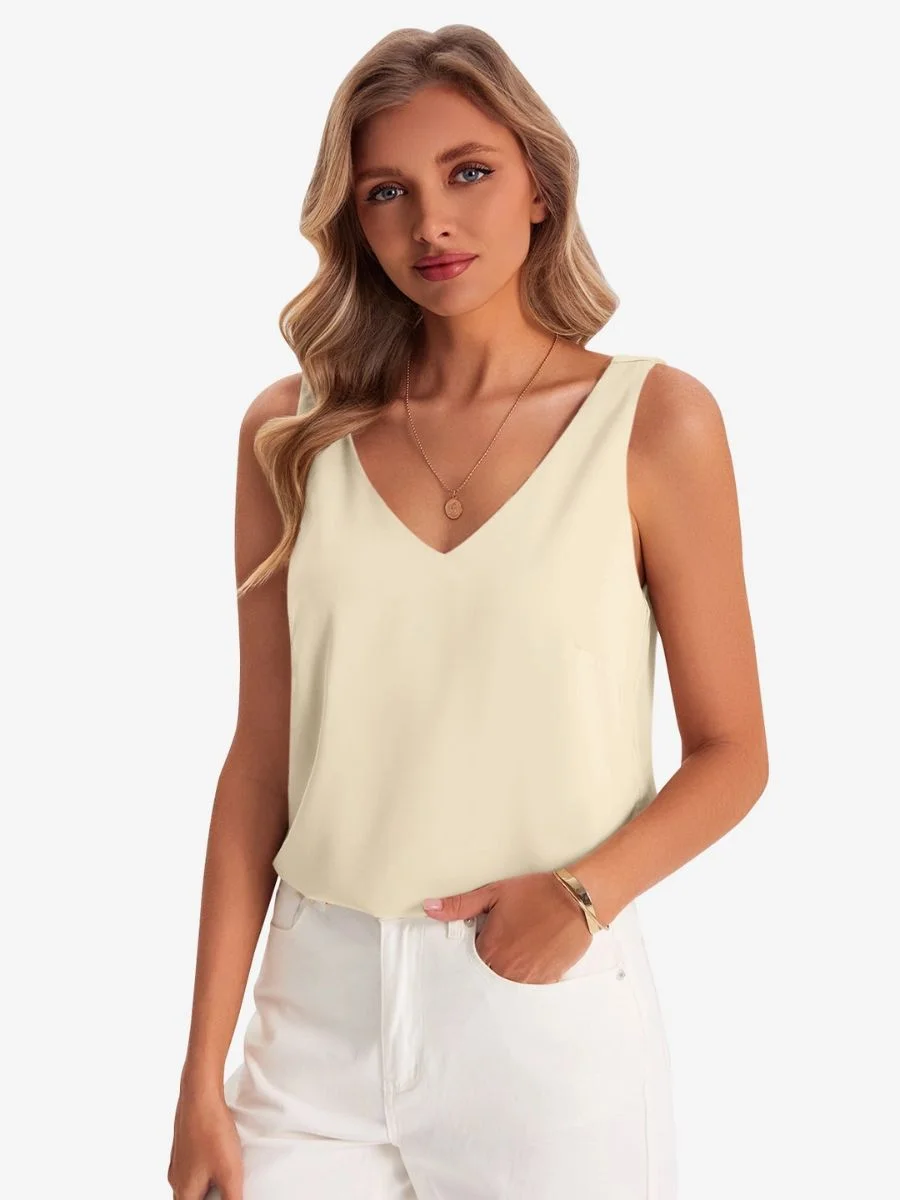 Cicy Bell beige v neck satin tank top on a model.