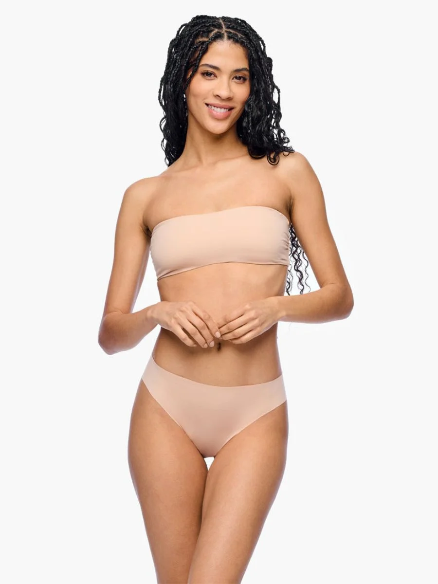 Product catalog photograph of the strapless Cosabella Free Cut Micro Bandeau Bra in the rich neutral shade Sette.