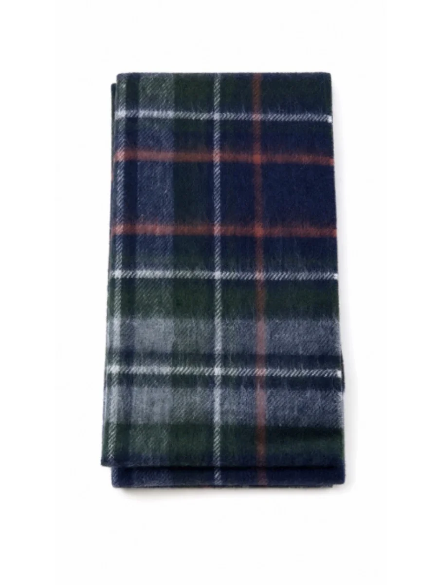 A folded wool scarf featuring a navy blue, dark green, and red tartan plaid pattern.