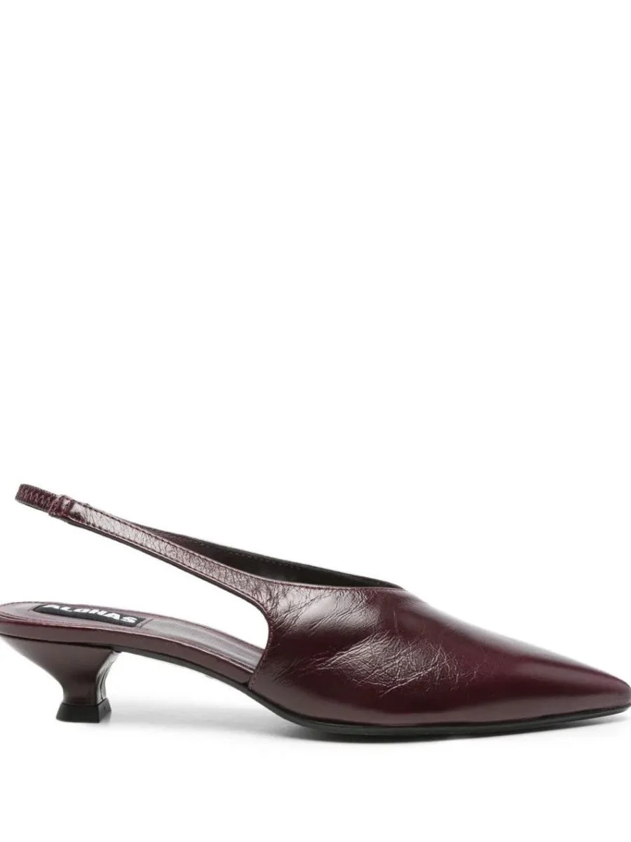 A side profile view of a dark burgundy leather slingback pump from ALOHAS featuring a pointed toe, a low kitten heel, a crinkled texture upper, and an elasticated ankle strap against a plain white background.